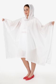 This universal rain poncho is made of a water resistant nylon to protect you from the elements. This lightweight can be tightly folded to fit into any bag so you'll always be prepared. Features an adjustable hood and generous fit and length to protect your clothes. Made in Los Angeles, Calif. Our experienced sewers earn up to $25 an hour and no less than $16; additionally workers have healthcare benefits for less than $15 per week, a 401k plan, paid sick days, subsidized bus passes and favorable Blue Algae, Los Angeles Apparel, Bus Pass, Jelly Flats, Garment Manufacturing, 401k, Rain Poncho, Running Shorts Women, Poncho Style