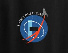 a black t - shirt with an image of a rocket ship and the words twenty one pilots on it