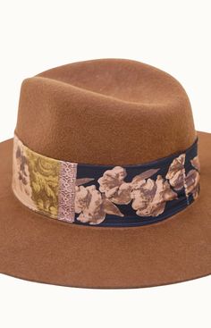 The Satin Banded Classic Wool Felt Rancher provides timeless style with a luxurious touch. The rich tonal satin lining and raw edging with double tonal stitching details elevate this rancher hat. With a 11cm crown height, 8cm brim length, and adjustable drawstring for sizing, it offers a perfect fit for a 58/59cm inner circumference. Perfect for any formal occasion. Country Style Hat Bands For Winter, Brown Flat Crown Felt Hat For Spring, Western Fedora With Flat Crown, Fedora For Country Events With Flat Crown, Flat Crown Rodeo Hat, Elegant Hat For Rodeo, Elegant Brown Hat Bands For Spring, Brown Hat Band For Spring, Pantry Gifts