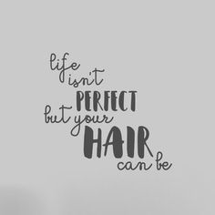 a wall decal that says life isn't perfect but your hair can be