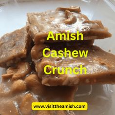 some food is in a plastic container with the words amish cashew crunch on it