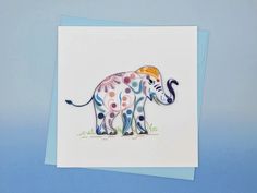 a card with an elephant painted on it