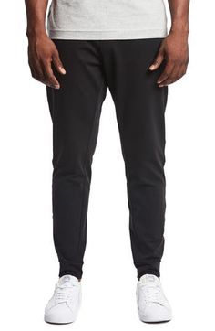 A stretchy, breathable and moisture-wicking blend means serious comfort in modern jogger pants. 26 1/2" inseam; 10" leg opening; 13" front rise; 15" back rise (size 32x30) Elastic waist Front slant pockets 88% nylon, 12% spandex Machine wash, tumble dry Imported Men's Clothing Valentino Sneakers, New Bra, Pants Design, Men's Clothes, Jogger Pants, Bottoms Pants, Clothing Items, Men's Clothing, Zip Pockets