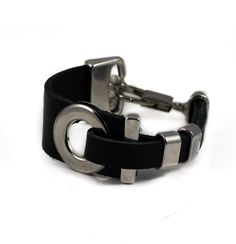 "A modern black leather bracelet with silver-plated designs for a rock style look! 🎔🎔 Thank you for visiting my store! Each piece is designed and handcrafted in our Zurich - Swiss studio and created to make you feel Unique, Edgy and Sharp...to make you feel Otherwise 🎔🎔 🎔 Handmade with genuine black leather and Zamak metal and silver-plated details. Zamak metal is a metal alloy deeply coated in silver and imported directly from Spain. It is world known for its weight, luster and durability. Leather Metal Jewelry, Statement Cuff Bracelet, Look Rock, Black Leather Bracelet, Style Rock, Leather Cuffs Bracelet, Unique Gifts For Her, Statement Bracelet, Handmade Bracelet