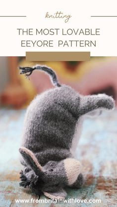 an elephant stuffed animal sitting on top of a wooden floor with the words, the most lovable eyore pattern