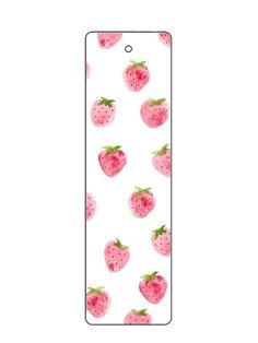 a bookmark with strawberries on it and green leaves in the middle, against a white background