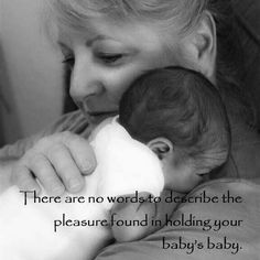 a woman holding a baby in her arms with the words there are no words to describe the pleasure found in holding your baby