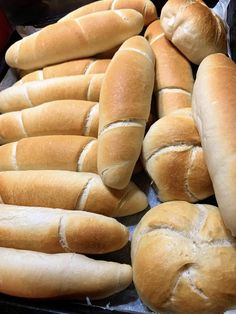 several loaves of bread sitting on top of each other