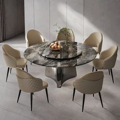 a marble dining table with six chairs around it and fruit on the plate at the center