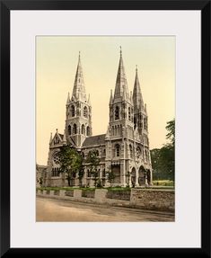 an old photo of a church with steeples