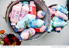 a bucket filled with lots of different types of toothpaste