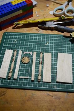 some tools are laying out on a cutting board