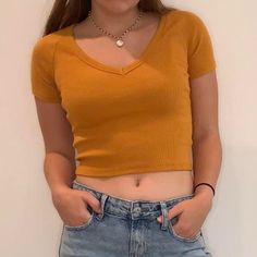 Size Small, Pictured On A Size Small Cute Summer Slightly Cropped Yellowey Brown Tee Casual And Cute, New With Tags, No Flaws. Orange Stretch V-neck Top, Stretch Orange V-neck Top, Casual Orange V-neck Crop Top, Trendy Yellow Stretch T-shirt, Trendy Stretch Yellow T-shirt, Casual Yellow Tops For Fall, Casual Yellow T-shirt For Fall, Yellow Stretch Short Sleeve Crop Top, Yellow Stretch Short Sleeve Top