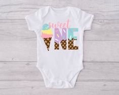 a white onesuit with the words sweet cone on it and an ice cream cone