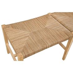 a wooden bench with woven seat cushions