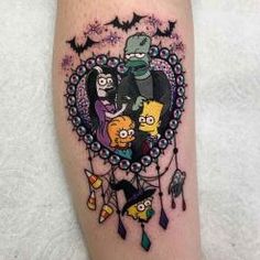 the simpsons family is depicted on this thigh piece by tattoo artist mike krabs