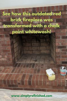 a brick fire place with a chalk paint whitewash