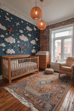 a baby's room with blue walls and wooden floors