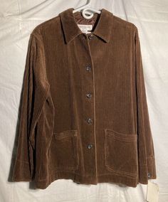 Vintage Jones New York Sport 5 Button Jacket Women's.   Brown   Large           Shell 100% cotton.           Lining 100% Polyester.  (On top 5" part of inside jacket). Light-weight Jacket for Summer / Spring / Fall.  Two Waist Pockets. Condition is New Old Stock with tags.  Shipped with USPS Mail/Fedex. Winter Corduroy Button-up Utility Jacket, Long Sleeve Corduroy Blazer For Fall, Corduroy Long Sleeve Blazer For Fall, Casual Corduroy Button-up Blazer, Long Sleeve Corduroy Outerwear With Buttons, Brown Corduroy Outerwear With Button Closure, Casual Corduroy Outerwear With Button Cuffs, Brown Corduroy Outerwear With Buttons, Corduroy Long Sleeve Outerwear With Buttons