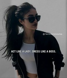 a woman wearing black sunglasses and a white top with the words act like a lady, dress like a boss