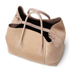 Suede Inside pocket Dimensions: 13.6"l x 6.7"w x 11.4"h Comes in a protective dust bag Made in Italy Care instructions: Only clean with a dry brush or dry cloth | AERIN Suede Mini Weekender Bag Bag in Sand size 13.6"l x 6.7"w x 11.4"h High-end Luxury Tote Bag, High-end Large Shoulder Bag For Everyday Use, Luxury Large-capacity Bag, Large Designer Beige Shoulder Bag, Large Beige Designer Shoulder Bag, Large Designer Beige Bag, Designer Large Beige Shoulder Bag, Large Beige Designer Bag, Luxury Everyday Satchel With Dust Bag