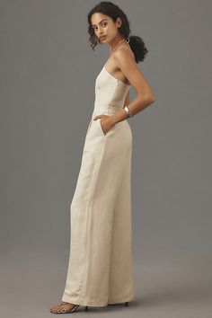 Linen, rayon; rayon lining Side slant pockets Back welt pockets Side zip Machine wash Imported | Thandie Linen Jumpsuit by PAIGE in White, Women's, Size: 6, Linen/Rayon at Anthropologie Elopement Jumpsuit, Fitted Linen Jumpsuits And Rompers With Pockets, Elegant Fitted Jumpsuits And Rompers With Pockets, Formal Fitted Jumpsuits And Rompers With Pockets, Formal Fitted Jumpsuits With Pockets, White Jean Jumpsuit, Cargo Jumpsuit, Pocket Jumpsuit, Green Jumpsuit