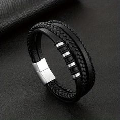 Men Fashion Punk Layered Braided Leather Bracelet Black Metal Minimalist Cuff Bracelet, Black Minimalist Metal Cuff Bracelet, Minimalist Black Metal Cuff Bracelet, Black Leather Punk Bracelets, Trendy Black Metal Wristband, Edgy Black Bracelet Strap Jewelry, Black Edgy Jewelry With Bracelet Strap, Edgy Black Jewelry With Bracelet Strap, Modern Black Stainless Steel Wristband