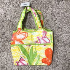 Nwt Adorable Tote W/Waterproof Inside. Large Pockets On Front & Back! Love The Big Pink & Orange Flowers. Square Flat Bottom Measures 8”X13”. 11” Y’all Plus Handles. So Cute! Cute Yellow Cotton Bags, Yellow Cotton Bags With Pockets, Cute Yellow Bags For Spring, Casual Yellow Bags With Pockets, Casual Reversible Bags For Spring, Playful Yellow Everyday Bag, Casual Reversible Spring Bags, Fun Yellow Summer Bag, Fun Yellow Summer Bags