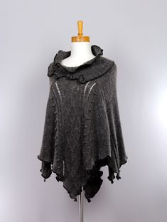 "One size taupe colored poncho with wide collar. Wear in all seasons in many different ways. Both practical and versatile, it can be worn every day and even for a special occasion. Perfect for chilly days or evenings. This versatile one-size-fits-all poncho-style cape is second to none for keeping you warm all year round. To revive your evening outfit with style and comfort, this shawl also includes a scarf and a brooch, it is an incomparable and unique asset of its kind. toutacoudemanou.etsy.com Care: Hand wash or machine wash on gentle cycle. Size: ONE SIZE Fiber: Unknown Dimension of the mannequin shoulder width: 15\" or 38 cm Colors may vary slightly depending on the screen." Gray Shawl Poncho For Winter, Gray Winter Shawl Poncho, One Size Gray Shawl For Winter, Gray One-size Shawl For Winter, Gray One Size Fall Cape, Cozy Gray Poncho For Fall, Good Day To You, Evening Outfit, Poncho Style