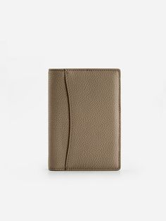 The PW Zero Waste Collection offers everyday accessories made from upcycled leathers, ensuring minimal waste and maximal resourcefulness. The Going Places Passport Wallet features compartments and credit card slots for on-the-go organization. Waste Collection, Going Places, Passport Wallet, Everyday Accessories, Passport Cover, Zero Waste, Full Grain Leather, Card Slots, Calf Skin