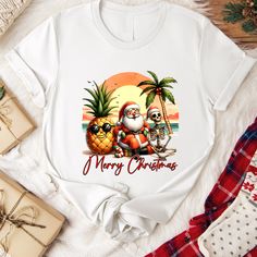 Merry Christmas In July Shirt Summer Tshirt Beach Shirt Sunshine Shirt Chrismas Gift for Women Santa Shirt Beach Shirt Palm Tree Shirt Welcome to CustomUniqueShirt! At CustomUniqueShirt, we design and create one-of-a-kind, custom clothing for everyone. We specialize in DTF (Direct to Film) printing, which creates bright and long-lasting designs on a variety of items. Whether you're looking for unisex t-shirts, sweatshirts, hoodies, toddler tees, youth tees, baby bodysuits, or women's v-neck shir Tree Tshirt, Santa Tee, Chrismas Gifts, Beach Tee, Santa Shirts, Tree Shirt, Toddler Tees, Beach Shirts, Christmas In July