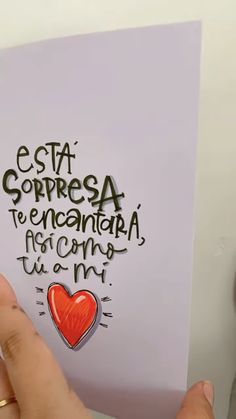 someone holding up a piece of paper with the words est compressa te encantura