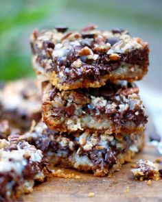 chocolate and coconut bars stacked on top of each other