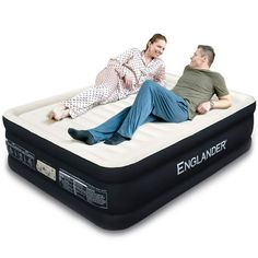 two men are laying on an inflatable bed with the word englander printed on it