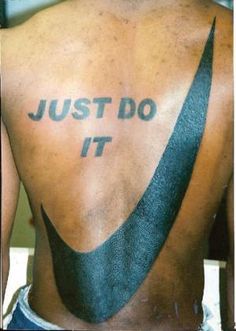 the back of a man's shirt with words written on it that says just do it