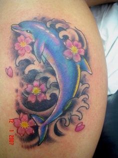 a dolphin with flowers on it's thigh