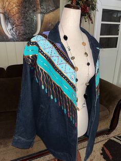 "Sundance" Denim Wear Hand-Painted Size Small Women Jacket. This is a Southwestern Aztec Style. This jacket is in MINT condition with NO tears or stains on the fabric!! This jacket has only been worn 1x.  Details: 1.) Breast: 46" inches 2.) Waist: 50" inches  3.) 2 Front pockets  4.) Shoulder to shoulder: 20" inches  5.) Sleeve length: 32" inches  6.) Shoulder to hem: 28" inches  Thanks for looking & please look at my listings for clothes Bohemian Dark Wash Denim Jacket For Fall, Western Blue Denim Jacket For Fall, Dark Wash Bohemian Outerwear For Fall, Bohemian Blue Denim Jacket For Fall, Bohemian Dark Wash Outerwear For Fall, Aztec Style, Aztec Fashion, Denim Wear, Small Women