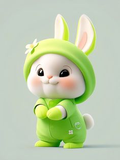 a small toy rabbit with a green outfit and flower on it's head, standing in front of a gray background