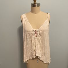 Brand New With Rages Super Cozy Ivory Asymmetrical Tank Top From Free People. Size Small , Made Of A Super Lightweight Comfy Cotton With Beaded Detail Embellished Cream Top For Summer, Summer Beaded Beige Tops, Beaded Beige Tops For Summer, Summer Beige Beaded Tops, Summer White Beaded Top, White Beaded Top For Summer, White Beaded Bohemian Tops, Asymmetrical Tank Top, Dash And Dot