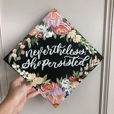 someone is holding up a graduation cap that says, we're the less she ever posted