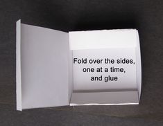 an open book with the words fold over the sides, one at a time, and glue