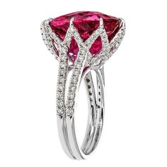 10.64 Carat Oval Checkerboard Cut Rubellite with 0.93 carat total weight white round brilliant side diamonds set in 18 karat white gold. Exquisite Brilliant-cut Ruby And Diamond Ring, Exquisite Ruby Ring With Brilliant Cut Diamond, Luxury White Diamond Ruby Ring, Luxury White Ruby Ring With Diamonds, Luxury White Ruby Ring With Brilliant Cut, Vvs Clarity Ruby Ring With Diamond, Formal Ruby Ring With Brilliant Cut Moissanite, Formal Moissanite Ruby Ring With Brilliant Cut, Formal Brilliant Cut Moissanite Ruby Ring