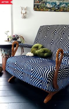 a blue and white patterned chair sitting on top of a hard wood floor