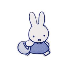 a blue and white sticker with a rabbit on it's back, sitting in front of a white background