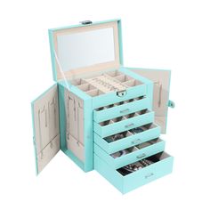 an open jewelry box with five drawers