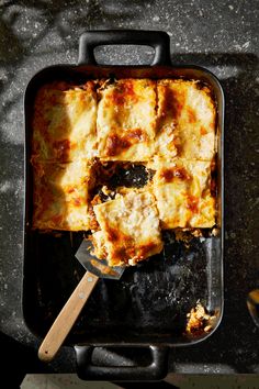 a casserole dish with meat and cheese in it, ready to be eaten