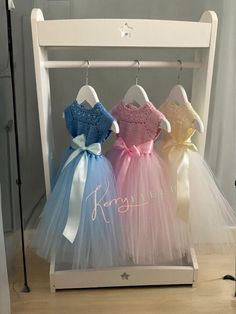 This stunning handmade crochet tutu dress is the perfect blend of elegance and playfulness, making it an adorable outfit for your little one. Available in pink, blue, and cream, each dress is crafted with soft cotton thread, featuring a delicate crochet bodice and a dreamy tulle skirt for that fairytale look. The ribbon corset tie on the reverse adds a charming touch, while also allowing for easy adjustments as your child grows. Details: 👗 Suitable for ages 12 to 18 months   👗 Adjustable ribbo Crochet Tutu Dress, Ribbon Corset, Crochet Tutu, Crochet Bodice, Delicate Crochet, Rose Bleu, Tutu Dress, Wedding Basket, Cotton Thread