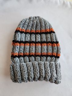 Knitted Handmade Hat cap soft Gray Black Orange Black Knitted Beanie In Acrylic Yarn, One Size Black Acrylic Yarn Beanie, Black Acrylic Yarn Beanie One Size, Black Acrylic Yarn Beanie Cap, Black Acrylic Yarn Beanie, Gray Knit Beanie Hat, Gray Soft Knit Hat, Soft Knit Beanie Cap, Adjustable Knitted Beanie