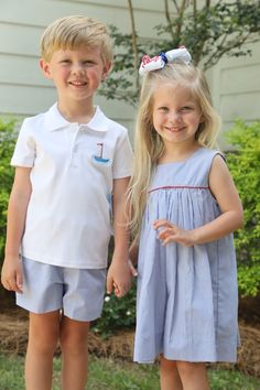 This handsome outfit will make your little boy feel like he's one of the big boys. Shorts are fully lined 100% cotton with elastic at the back waist. The polo shirt is 100% Pima cotton knit. The shirt is embroidered with a sailboat. Preppy Cotton School Sets, Handsome Outfit, Matching Embroidery, Stripe Shorts, Boys Shorts, Boy Blue, Kids Pictures, Boys Shirts, Cotton Knit