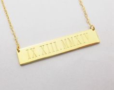 "The Sterling Silver Roman Numeral Bar Necklace 18K Gold Plated - A perfect gift for wedding holidays, anniversaries, birthdays,valentine, Christmas,mother's day and more. Wear the roman numberal engraved on a beautiful Gold Plated bar Necklace! Bar necklaces are a popular trend in the fashion world and you definitely do not want to be without one in your wardrobe! All of my products are handmade. Why buy from us? Quality Product At Affordable Prices 1.2mm Super Thickness. 100% Satisfaction Guar Gold Nameplate Necklace For Wedding Gift, Personalized Rectangular Jewelry For Wedding Gift, Silver Bar Necklace For Anniversary, Rectangular Gold Necklaces For Wedding, Gold Rectangular Necklace For Wedding, Rectangular Gold Necklace For Wedding, Customizable Gold Bar Necklace For Anniversary, Elegant Customizable Bar Necklace For Gifts, Personalized Bar Necklace For Anniversary